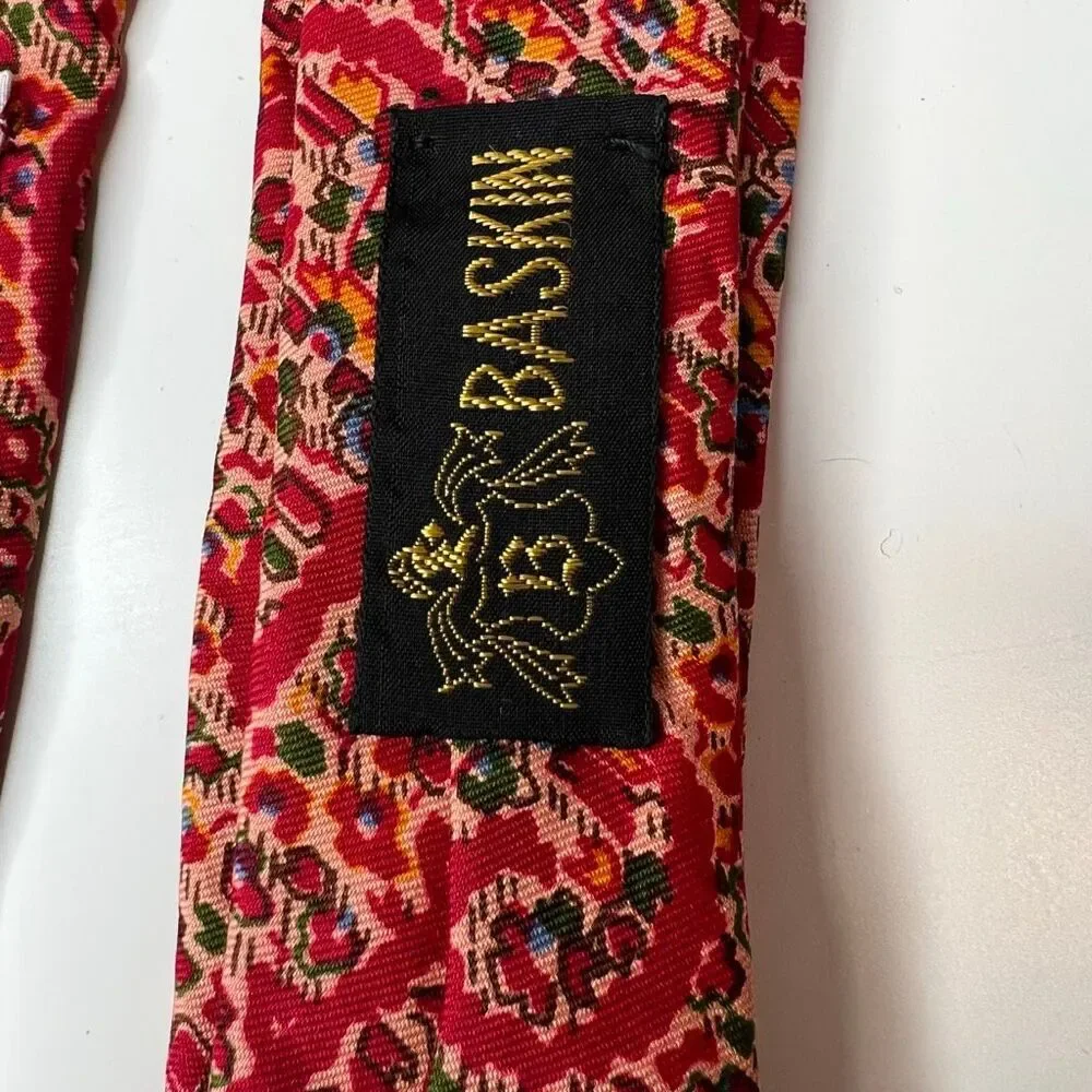 Liberty of London vintage red patterned silk necktie features a vibrant tie